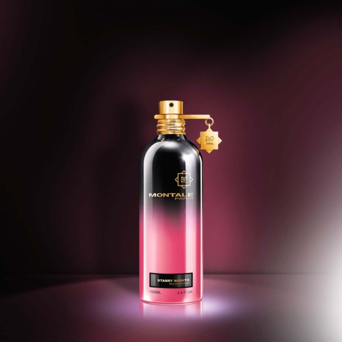 En lang, elegant flaske med gradient fra rosa til svart, gullhette og hengende pynt, merket 'Montale' og 'Starry Nights.'