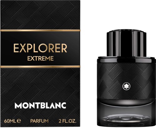 Een Montblanc Explorer Extreme parfumdoos en fles in zwart met goud- en witte tekst en patronen.