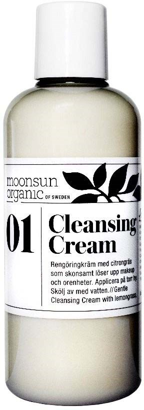 Een witte fles met label 'Cleansing Cream' met een zwart-wit organisch logo en tekst, bevat huidverzorgingsproduct.