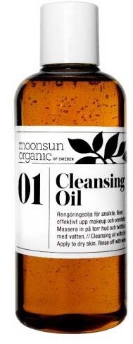 Een amberkleurige glazen fles met witte dop en label, aangeeft dat het Moonsun Organic Reinigingsolie voor het gezicht is.