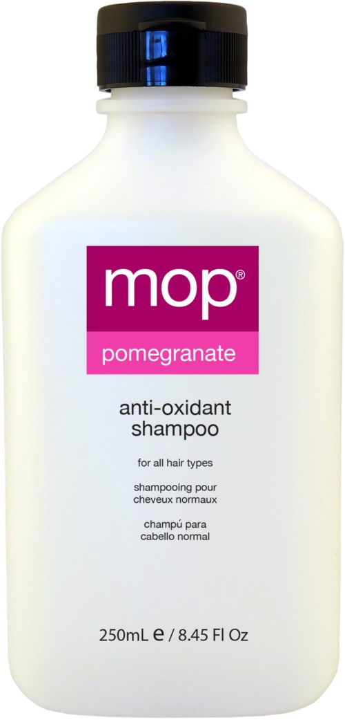 Eine weiße Flasche mit schwarzem Deckel, beschriftet 'mop granatapfel antioxidant shampoo,' 250 ml, für alle Haartypen.