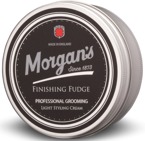 Ein runder Behälter mit schwarzem Etikett, weißem Text und rotem Logo oben. Es sagt Morgans, finishing fudge und grooming.