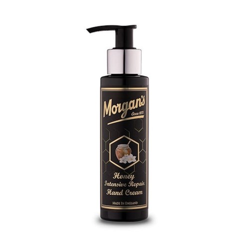 A black bottle with a pump, labeled Morgan's Honey Hand Cream, in gold and white text, and honeycomb graphics.