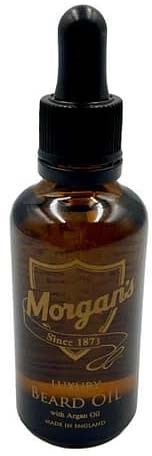 En liten brun flaske med svart dråpetrekork merket 'Mogame Beards Oil' for ansiktshårpleie.