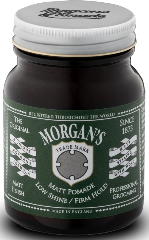A black jar with a green label and white lid, labeled Morgans Matt Pomade for hair styling and grooming.
