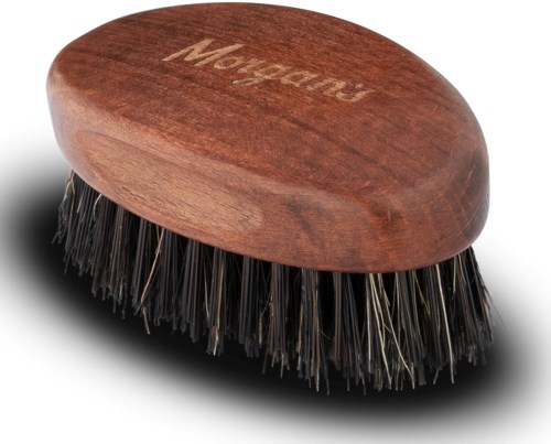 A grooming brush with a wooden handle and metal bristles, used for cleaning hair or fur.