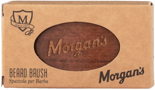 A cardboard box with a wooden beard brush inside, labeled Morgan's, with a logo and text. Ends with a period.