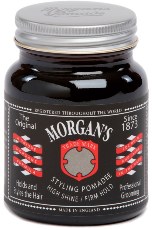 En krukke med Morgan's stylingpomade, svart med sølvlokk, har logoer og tekst for hårstyling og grooming.
