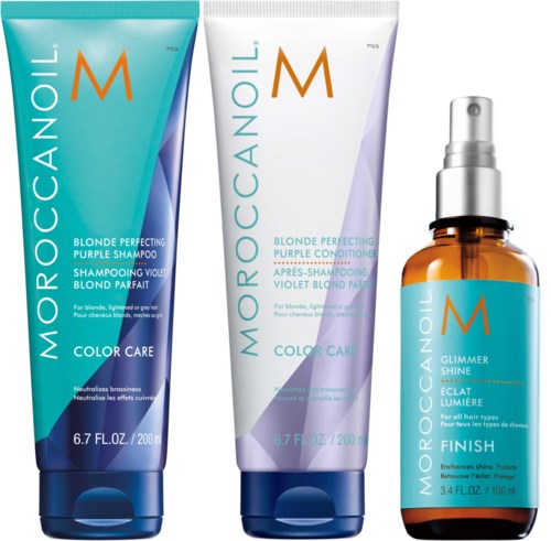 Three hair care products; two tubes and a spray bottle, with blue, white, and amber colors.