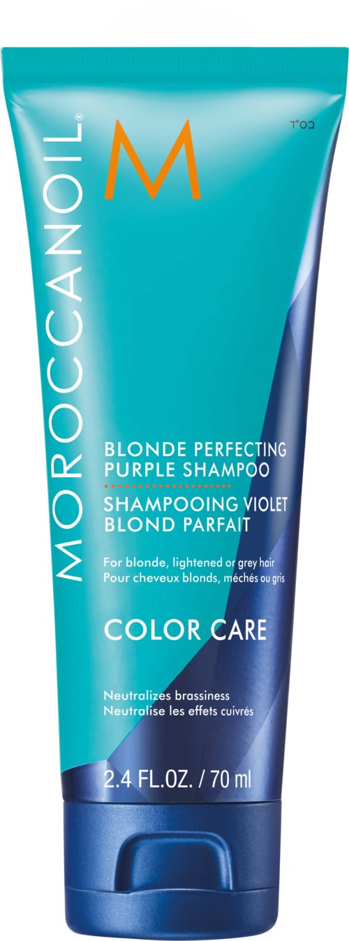 Blue tube of hair shampoo with white and orange text, claiming to brighten blonde or gray hair.