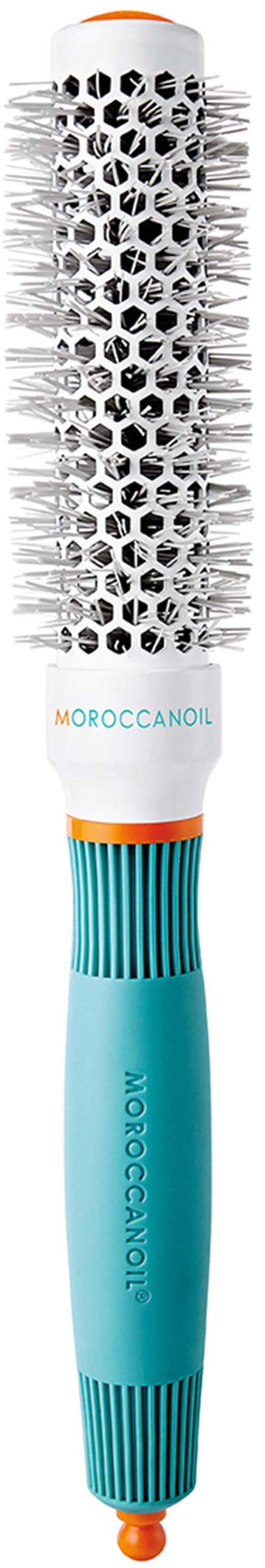 A round hairbrush with white, black, turquoise, and orange colors, featuring a handle and bristles. It is for styling hair.
