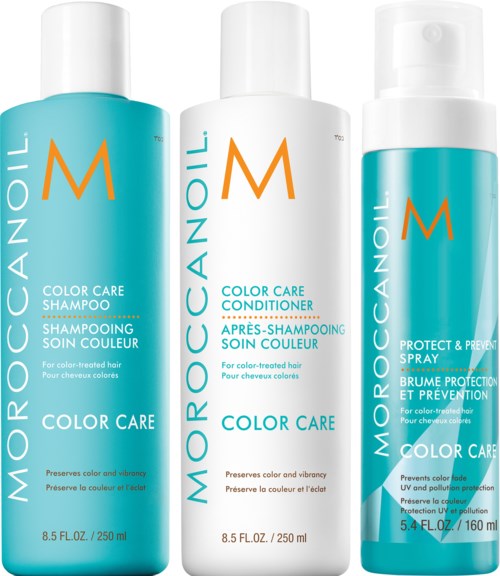 Three bottles of hair care products for color-treated hair: shampoo, conditioner, and spray.