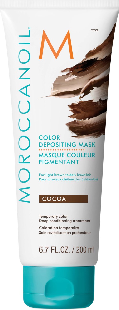 A white tube of Moroccanoil color depositing mask with blue and orange text, and a brown photo design.