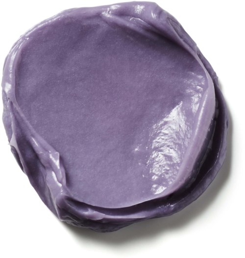 Violetti, pyöreä esine, jolla on sileä, kiiltävä pinta, mahdollisesti lasitettu keramiikka tai kivi.