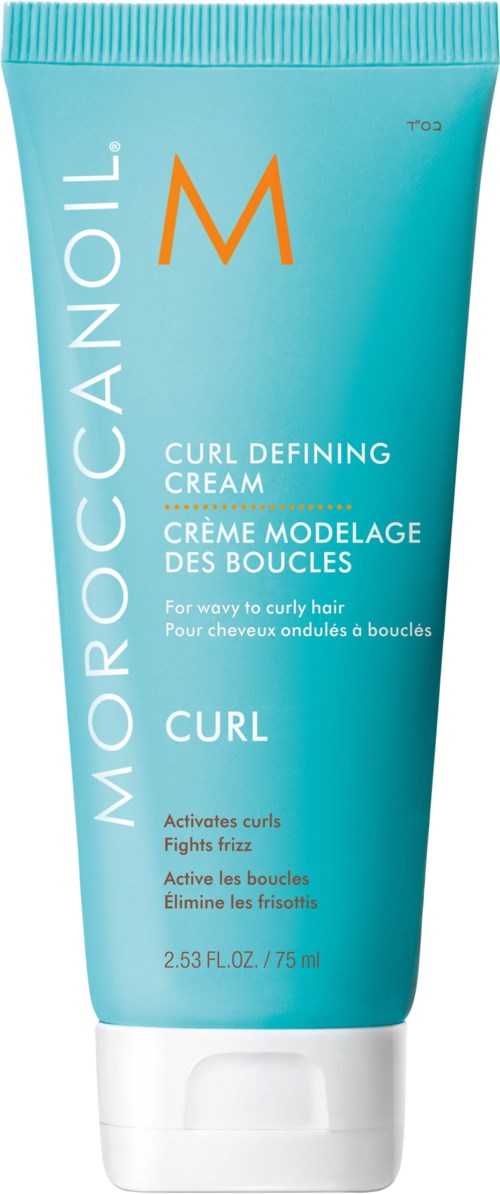 Putki on turkoosi jossa on oranssia ja valkoista tekstiä, nimeltä Moroccanoil Curl Defining Cream kiharoille ja laineille.