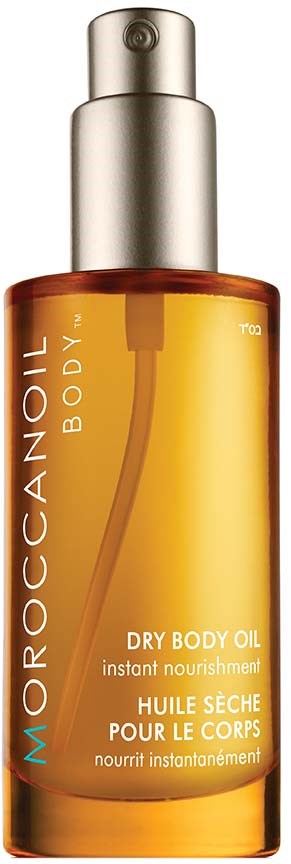 A bottle of Moroccan Oil dry body oil for skin nourishment, with a silver cap and golden liquid inside.