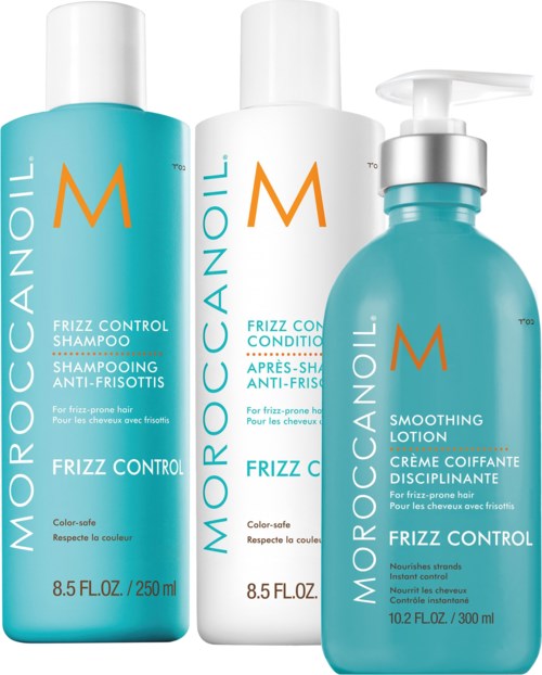 Three hair care bottles: shampoo, conditioner, and lotion from Moroccanoil, all for frizz control and smoothing.