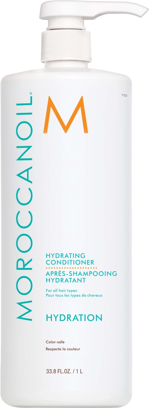 En vit flaska med pump, märkt Moroccanoil Hydrating Conditioner för alla hårtyper, 33,8 fl oz.