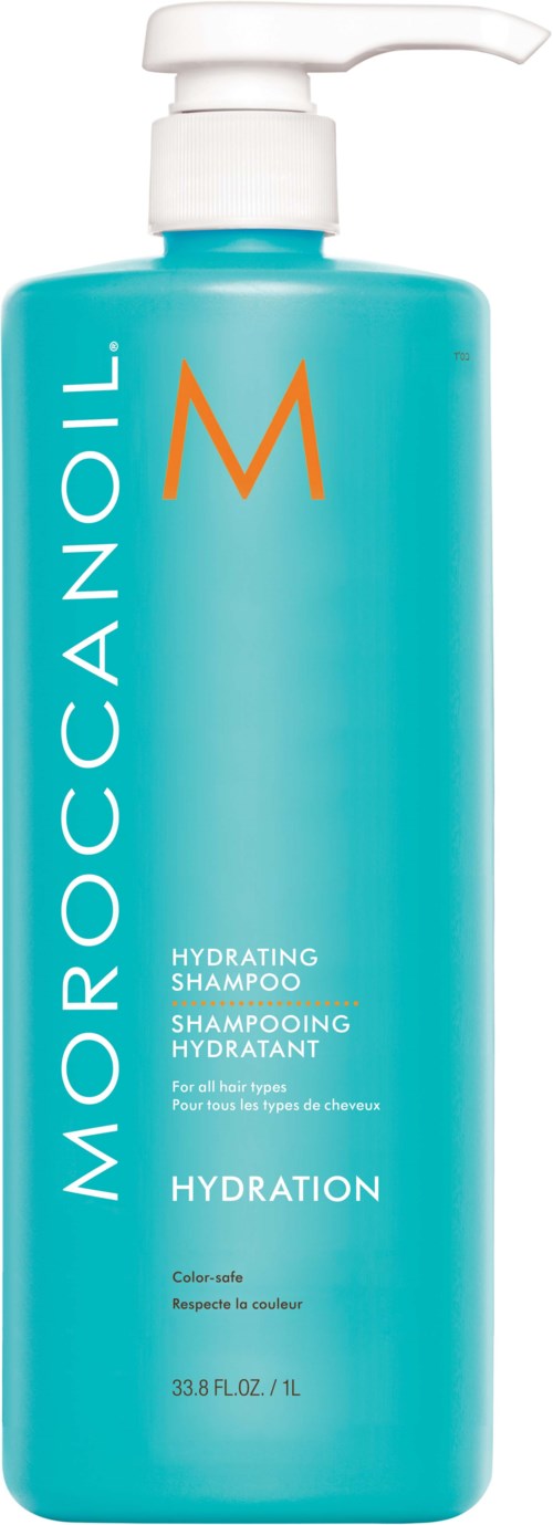 En lång blå flaska med vit pump, märkt 'Moroccanoil Hydrating Shampoo,' med orange och vitt text.