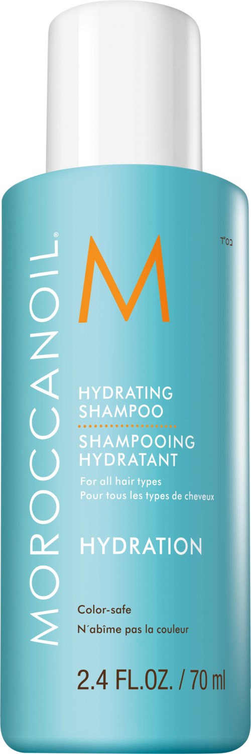 A blue bottle of Moroccanoil hydrating shampoo with white cap, label showing product details and size.