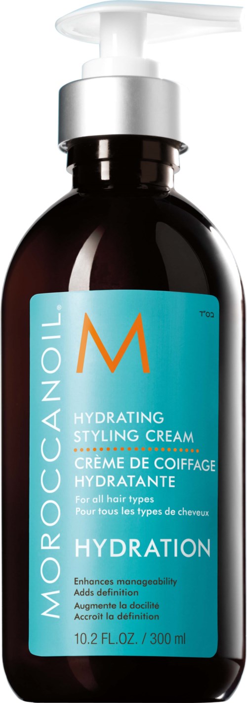 A dark brown bottle with a pump dispenser holds Moroccanoil Hydration Styling Cream, labeled for all hair types.
