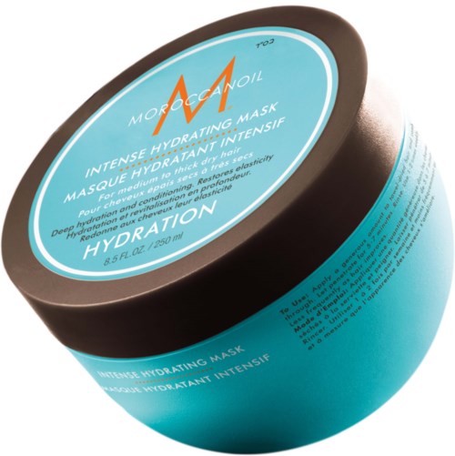 Pyöreä Moroccanoil Intense Hydrating Mask -rasia, sininen ja musta kansi, etiketti näyttää tuotteen tiedot ja logon.