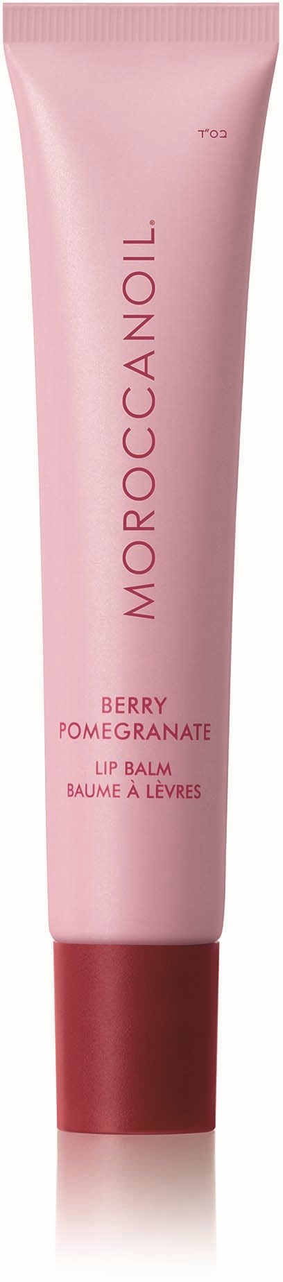 A pink tube of Moroccanoil lip balm with berry pomegranate flavor written on it.