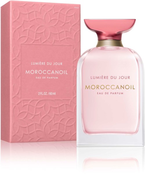 Pink perfume bottle with a gold cap and matching pink box featuring a floral pattern.