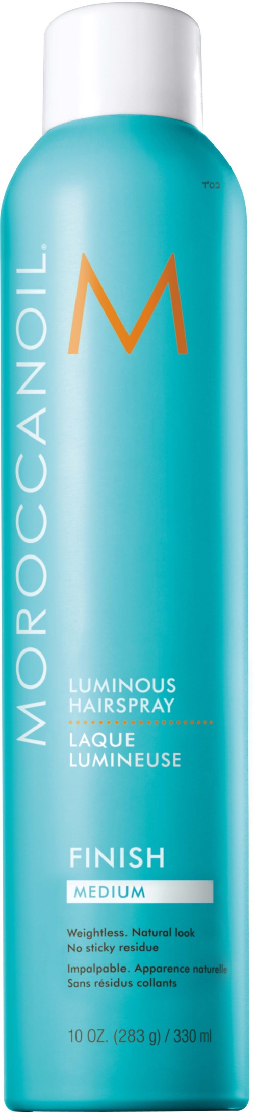 A tall blue can of Moroccanoil luminous hairspray with a white cap. The label includes words like 'Finish Medium' and '15 oz.'