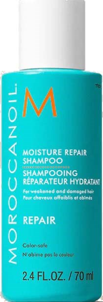 Sininen Moroccanoil Moisture Repair Shampoo -pullon, jossa valkoinen korkki. Etiketti korjaa vahingoittunutta hiusta, 70 ml.
