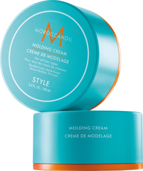 A round container of MoroccanOil Molding Cream in blue with orange accents, labeled for all hair types, 100ml.