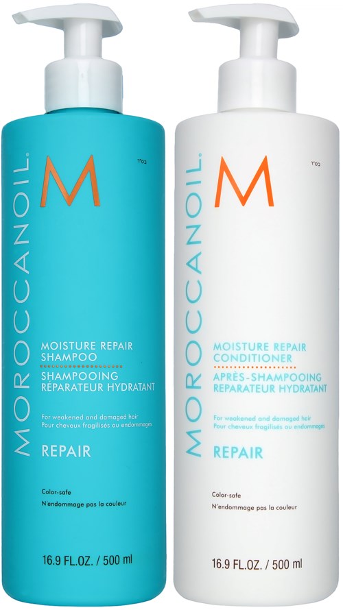 Two bottles of Moroccanoil hair care products, one blue for shampoo and one white for conditioner.