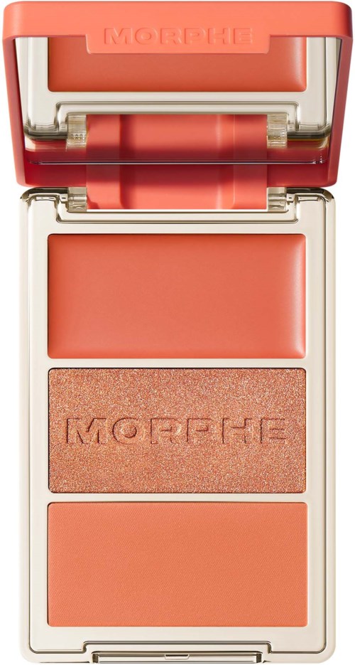 A makeup palette with three shades of pink, placed in a white case with a mirror on top.