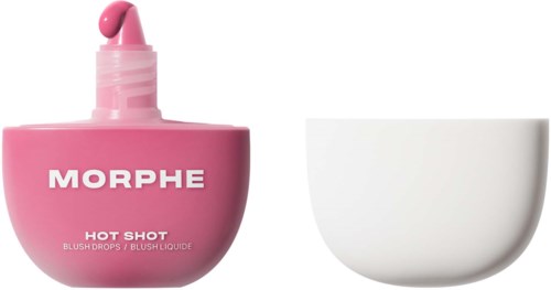 Rosafärgad flaska av Morphe Hot Shot blush drops med lock och en tom vit skål bredvid.
