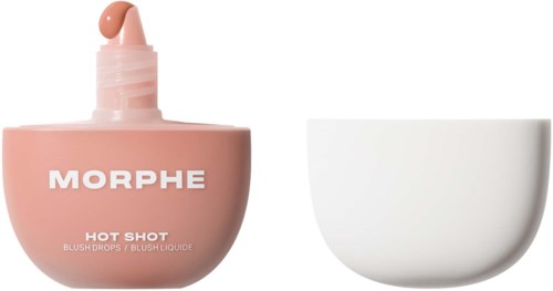 En rosa flaska med Morphe blush och en vit skål bredvid. Flaskan har en dropp på locket.