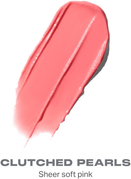 Ett mjukt rosa läppstiftstift med orden Clutched Pearls och sheer pink längst ner.