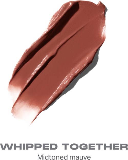 En smet av mauve läppstift med texten Whipped Together i grå bokstäver.