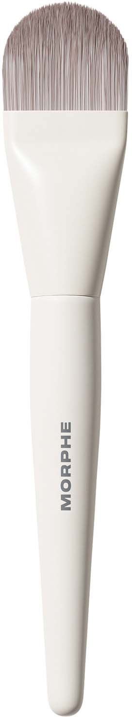 A white makeup brush with a flat, rounded top and the word MORPHE written on the handle.
