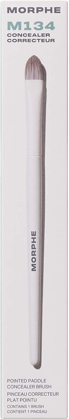 A white makeup brush with a pointed tip in box labeled Morphe M134 concealer corrector.
