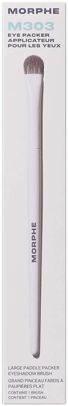 A long white makeup brush with a brown tip, packaged in a Morphe box, used for blending eyeshadow.