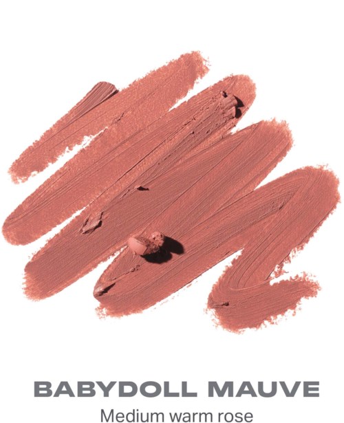 Prøver av medium varm rose leppestift eller gloss i en kremaktig tekstur.