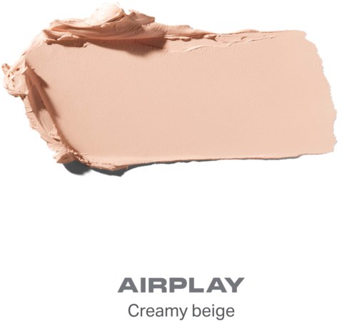Ett krämigt beige makeupsample med ordet AIRPLAY och beskrivningen krämig beige.