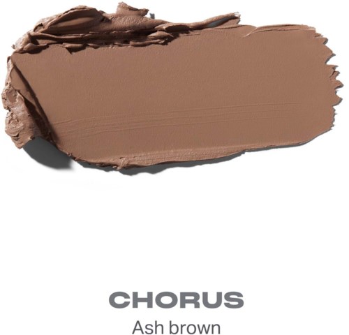 En tjock, slät smet av asbrow makeup eller färg med några ruffa kanter och textur.