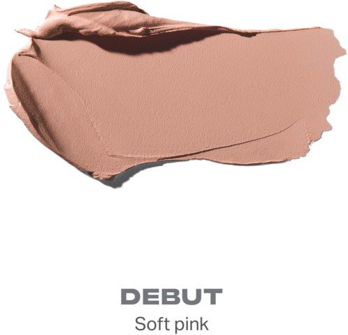 En mjuk rosa kosmetikkräm utsträckt på en vit bakgrund med orden DEBUT och Soft pink nedan.
