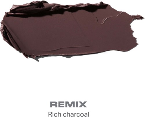 En mörkbrun, smutsig, rektangulär yta av rikhärdat kol på en vit bakgrund med orden REMIX och rich charcoal.