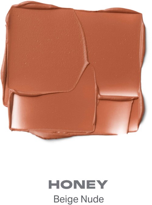 Ett beige nude läppstift med en slät, glänsande yta och oregelbunden form. Ordet honey är skrivet nedanför.