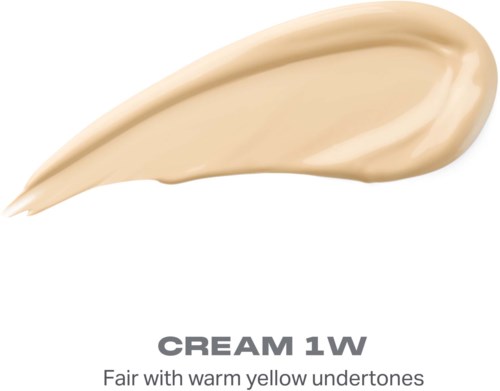 En provbubbla av krämig beige sminkprodukt märkt CREAM 1W med beskrivning av ljus hud och varma gula undertoner.