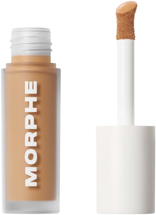 En beige flytande foundationflaska med vit lock och en applikatorsticka med svamp.