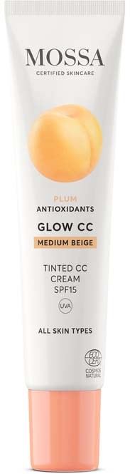 Rör av Mossa Glow CC Cream med persika och svart text, SPF 15, lämplig för alla hudtyper.