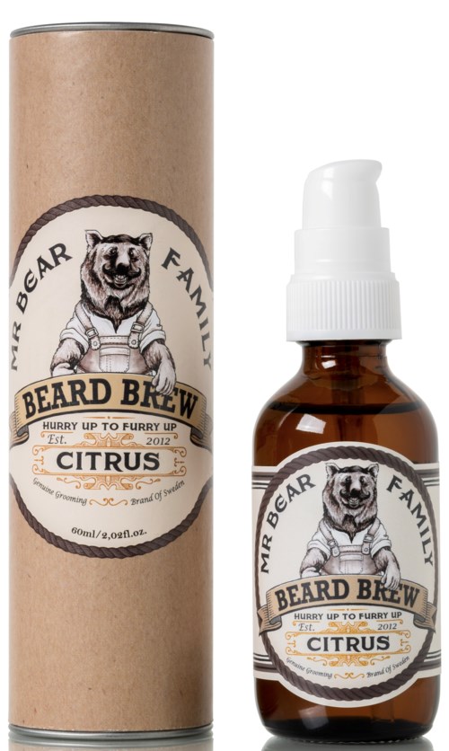 Flaska med skäggolja med en etikett som visar en björn, märkt "Mr. Bear Family Beard Brew Citr" i en brun behållare.